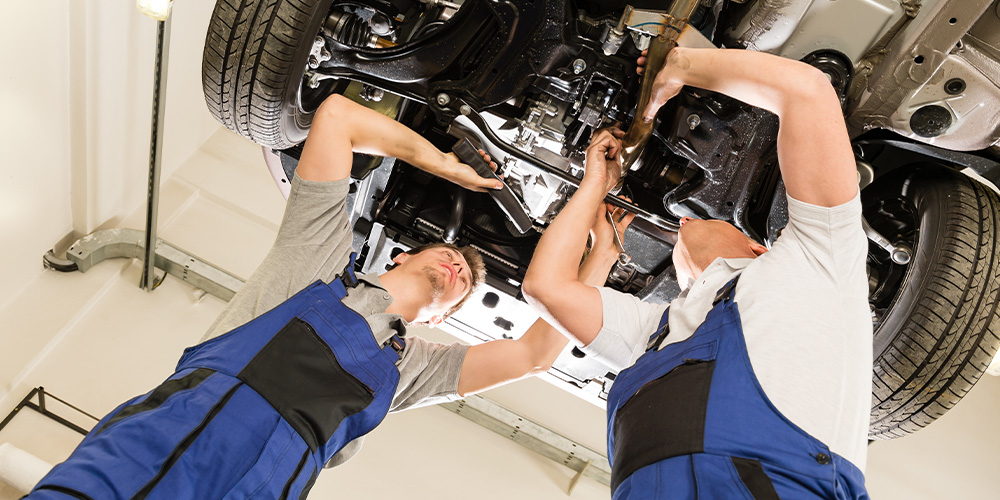 Photo of Mechanics fixing car